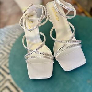 Lulu's Ralstonn White Satin Rhinestone Ankle Strap the perfect wedding heel. 8.5